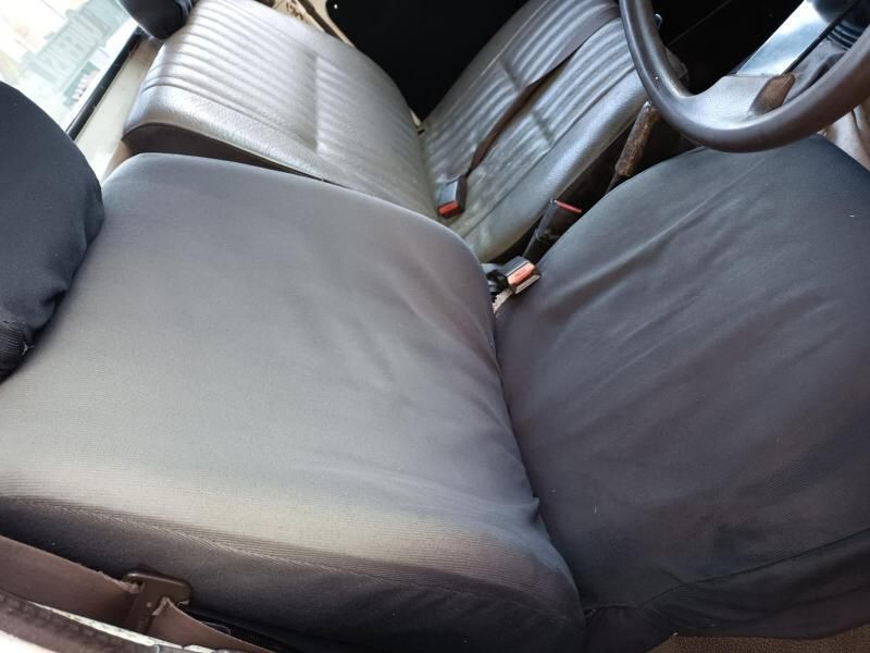 A Close Up of a Car Seat With a Steering Wheel in the Background — South West 4WD Wreckers In Brisbane, QLD