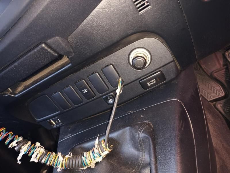 A Close Up of a Car Dashboard With Buttons and a Switch — South West 4WD Wreckers In Harristown, QLD