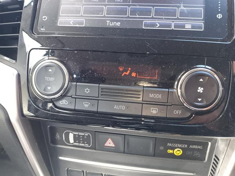 A Close Up of a Car Dashboard With a Radio and a Climate Control — South West 4WD Wreckers In Harristown, QLD
