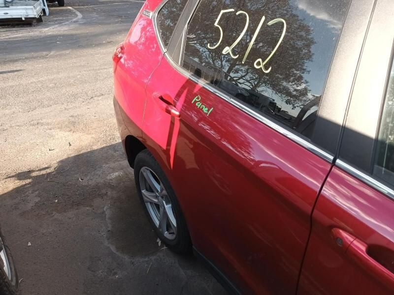 A Red Car With the Number 5212 Written on the Back Window — South West 4WD Wreckers In Brisbane, QLD