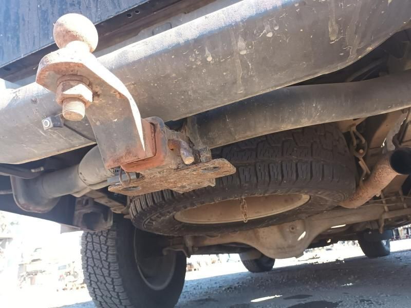 The Underside of a Truck With a Trailer Hitch Attached to It — South West 4WD Wreckers In Harristown, QLD