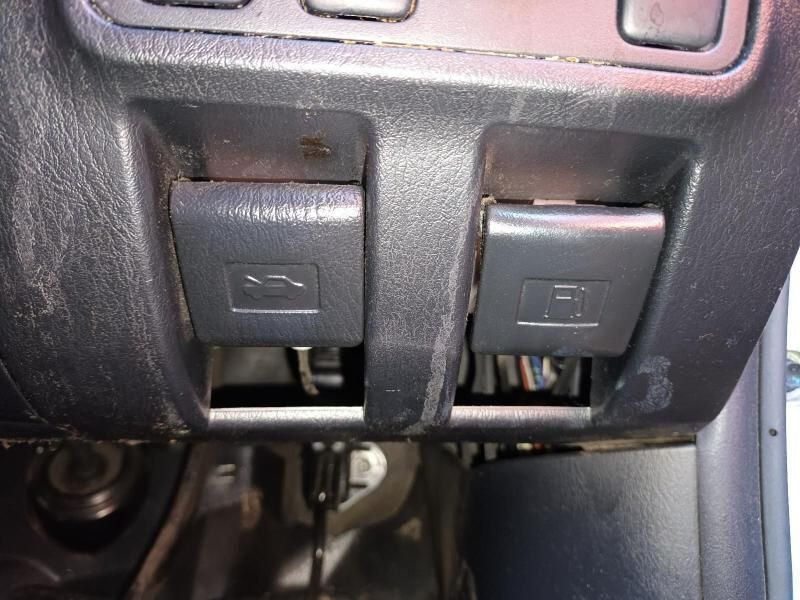 A Close Up of a Car Dashboard With a Button That Says E on It — South West 4WD Wreckers In Harristown, QLD