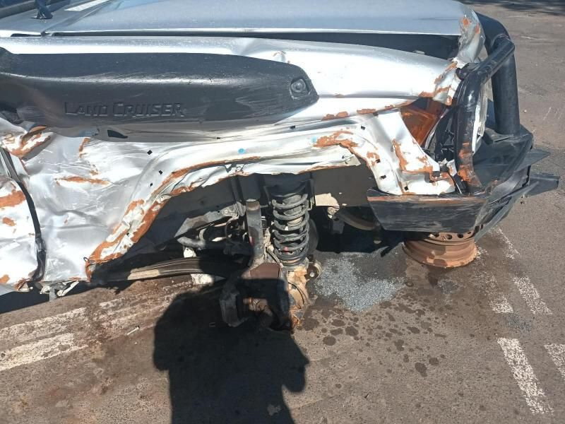 A Silver Jeep That Has Been Damaged in an Accident — South West 4WD Wreckers In Harristown, QLD