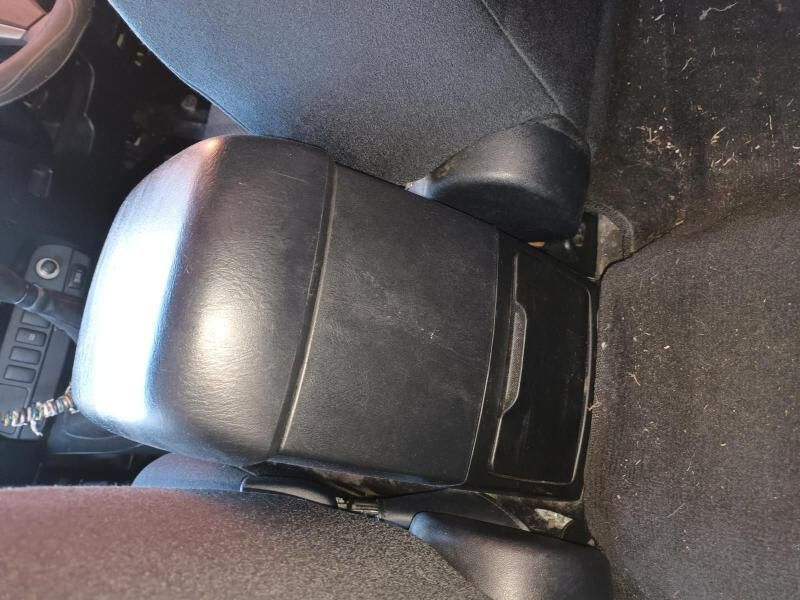 A Black Arm Rest in the Back Seat of a Car — South West 4WD Wreckers In Harristown, QLD