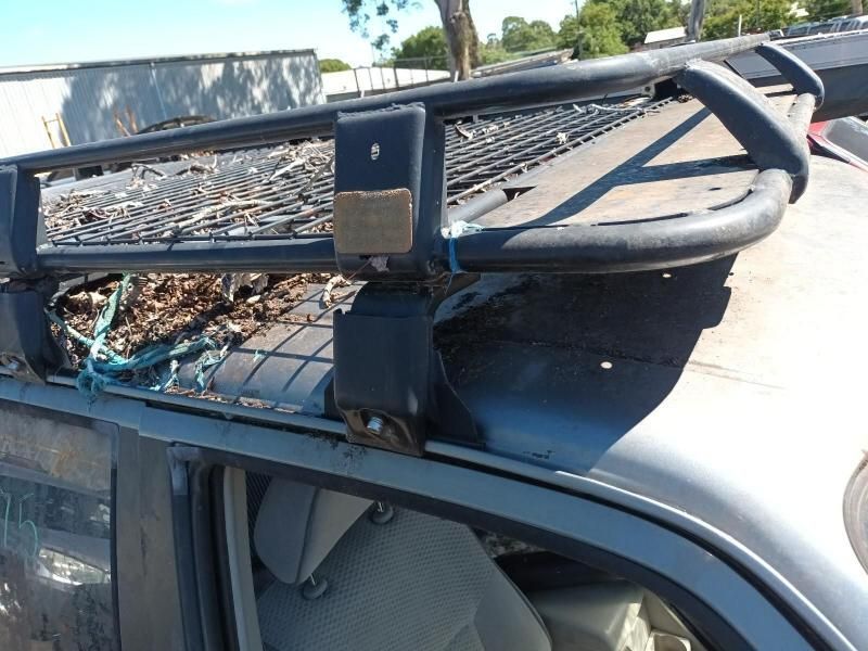 A Car With a Roof Rack on Top of It — South West 4WD Wreckers In Harristown, QLD