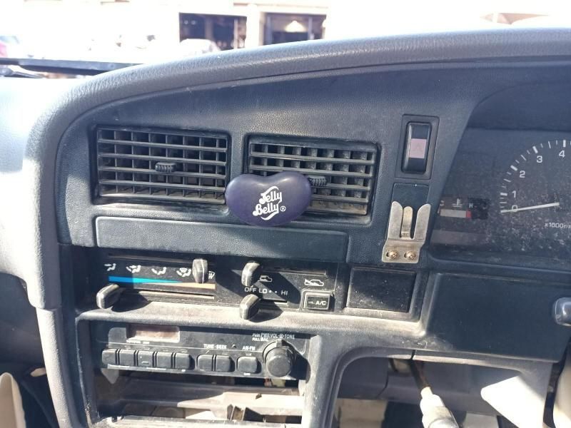 The Dashboard of a Car With a Purple Item on It — South West 4WD Wreckers In Brisbane, QLD