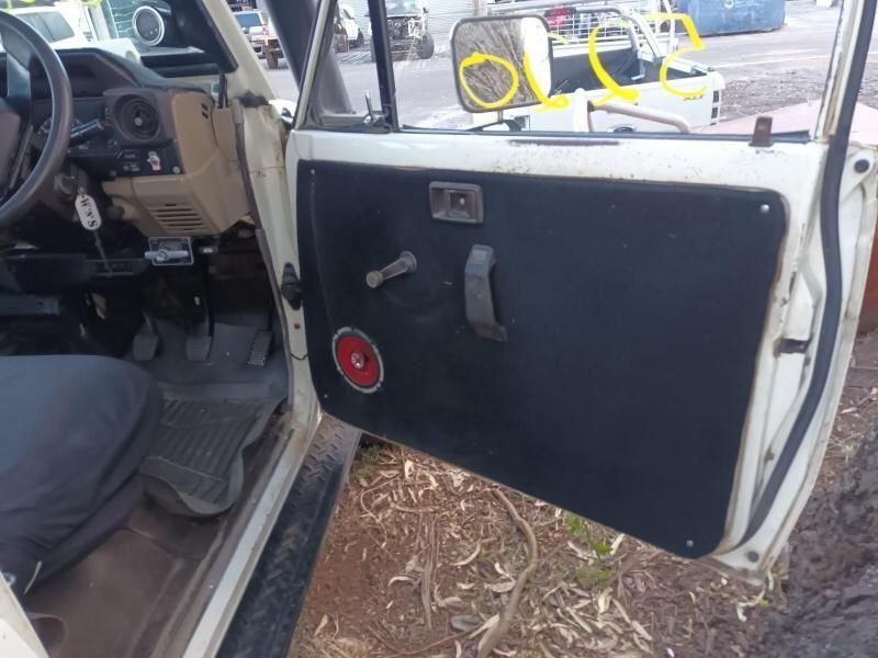 The Inside of a White Car With the Door Open — South West 4WD Wreckers In Brisbane, QLD