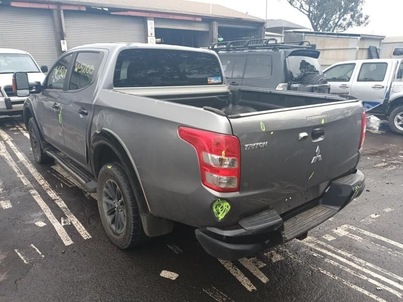 A Gray Pickup Truck is Parked in a Parking Lot — South West 4WD Wreckers In Brisbane, QLD