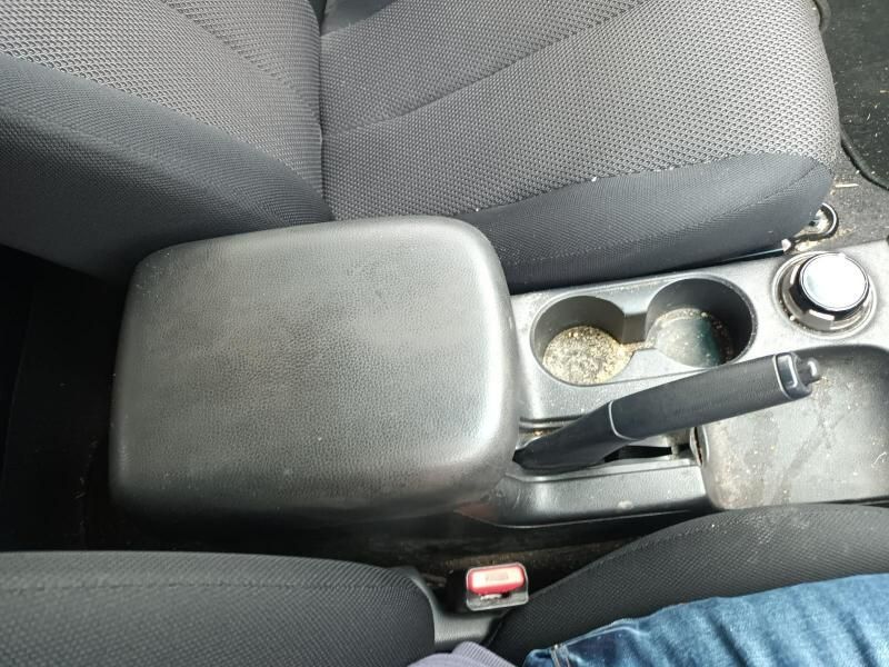 A Person is Sitting in the Driver 's Seat of a Car — South West 4WD Wreckers In Brisbane, QLD