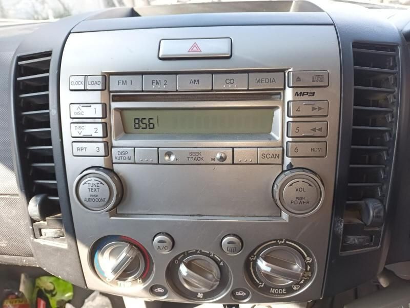A Car Radio With the Number 056 on the Screen — South West 4WD Wreckers In Harristown, QLD
