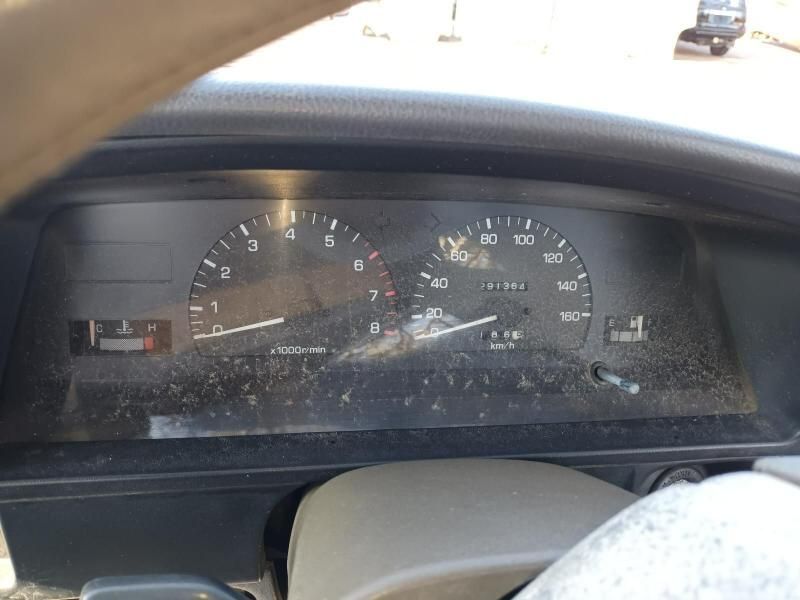 A Close Up of a Car Dashboard With a Speedometer That Shows a Speed of 100 — South West 4WD Wreckers In Brisbane, QLD