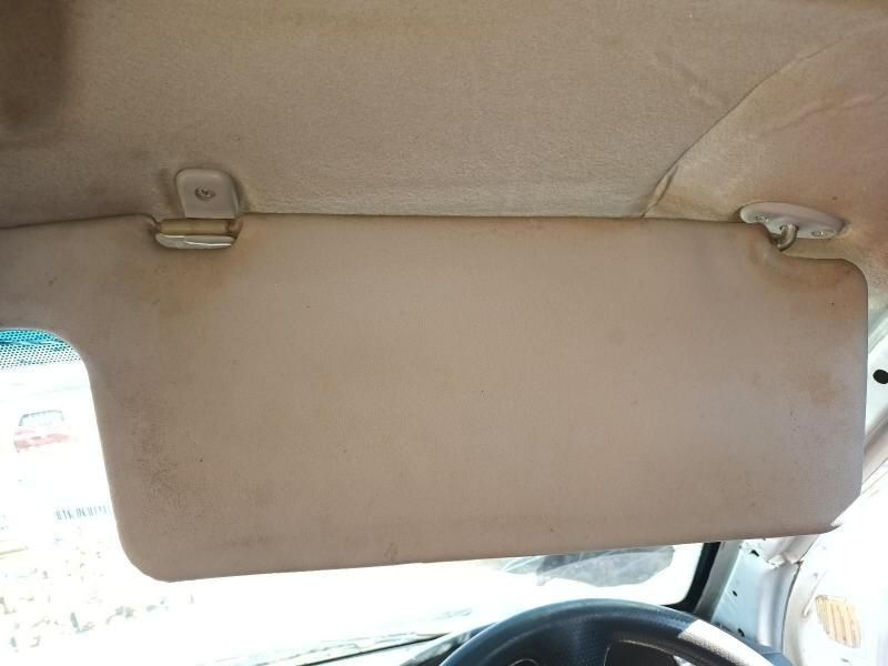 A Sun Visor is Hanging From the Ceiling of a Car — South West 4WD Wreckers In Harristown, QLD