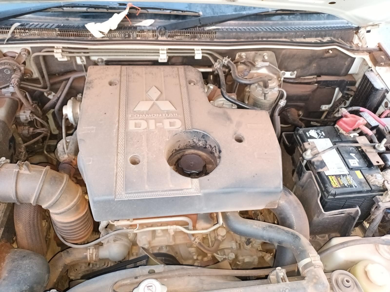 A Close Up of the Engine of a Dirty Car — South West 4WD Wreckers In Brisbane, QLD
