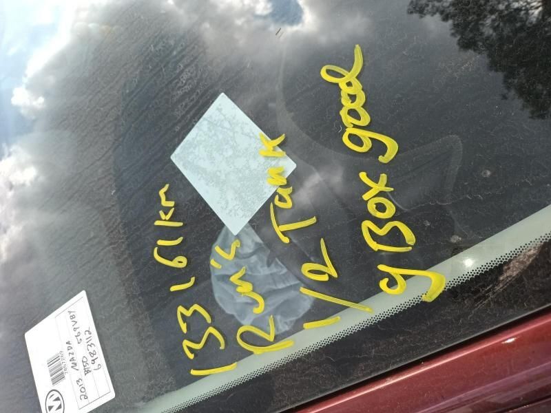 A Close Up of a Car Windshield With Yellow Writing That Says ' Y Box Good ' — South West 4WD Wreckers In Harristown, QLD