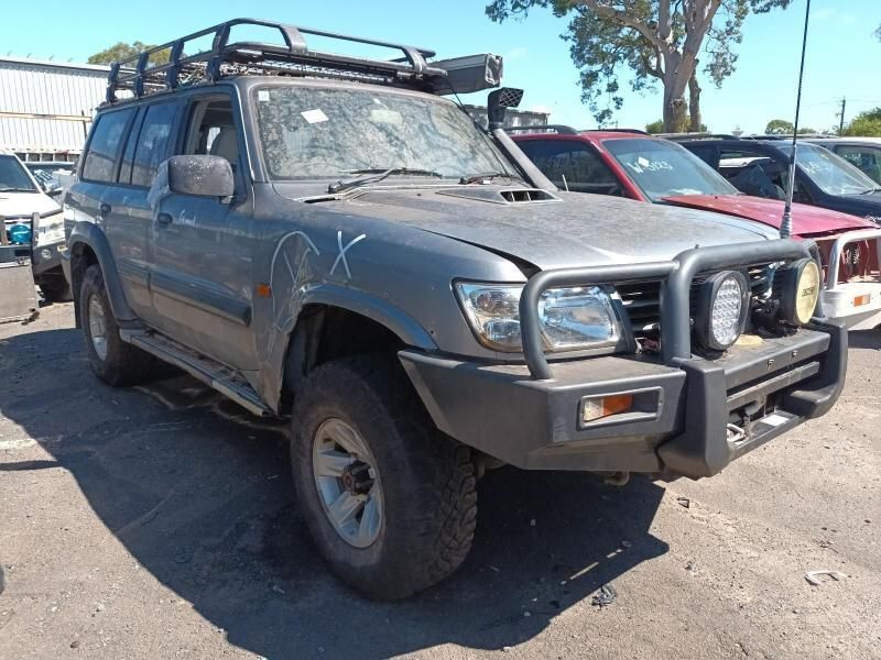 A Gray Suv With a Roof Rack is Parked in a Parking Lot — South West 4WD Wreckers In Harristown, QLD