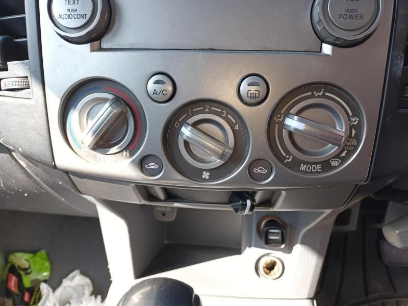 A Close Up of a Car Dashboard With a Few Buttons on It — South West 4WD Wreckers In Harristown, QLD