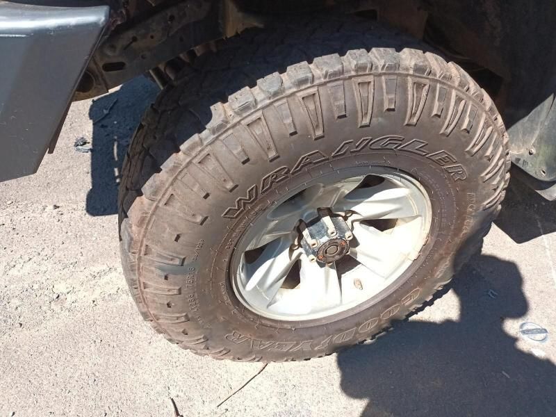 A Close Up of a Tire on a Car That Says ' Wild ' on It — South West 4WD Wreckers In Harristown, QLD