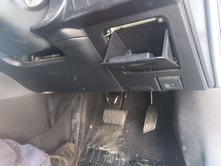 A Person is Sitting in the Driver's Seat of a Car — South West 4WD Wreckers in Harristown, QLD