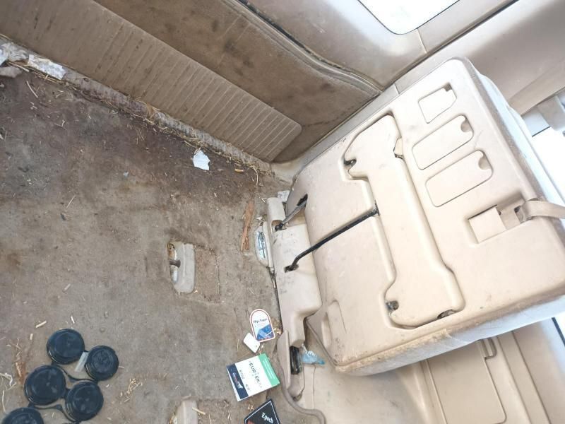 The Back Seat of a Car With a Dirty Floor — South West 4WD Wreckers In Harristown, QLD