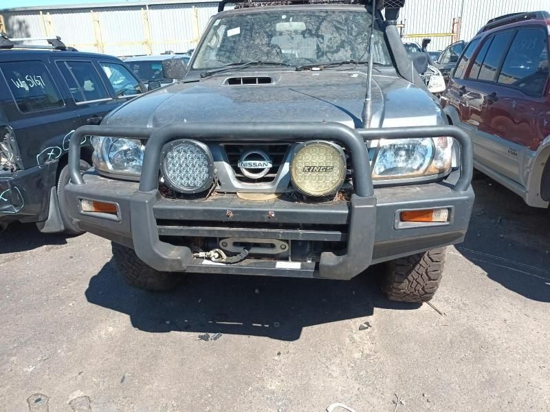 A Nissan Patrol is Parked in a Parking Lot — South West 4WD Wreckers In Harristown, QLD