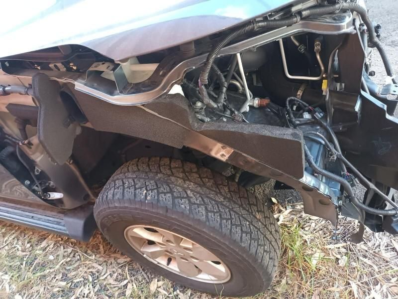 A Close Up of a Damaged Car With the Fender Missing — South West 4WD Wreckers In Harristown, QLD