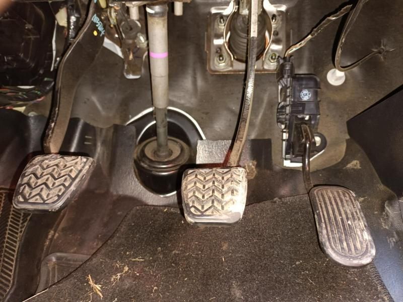 A Close Up of the Brake Pedals of a Car