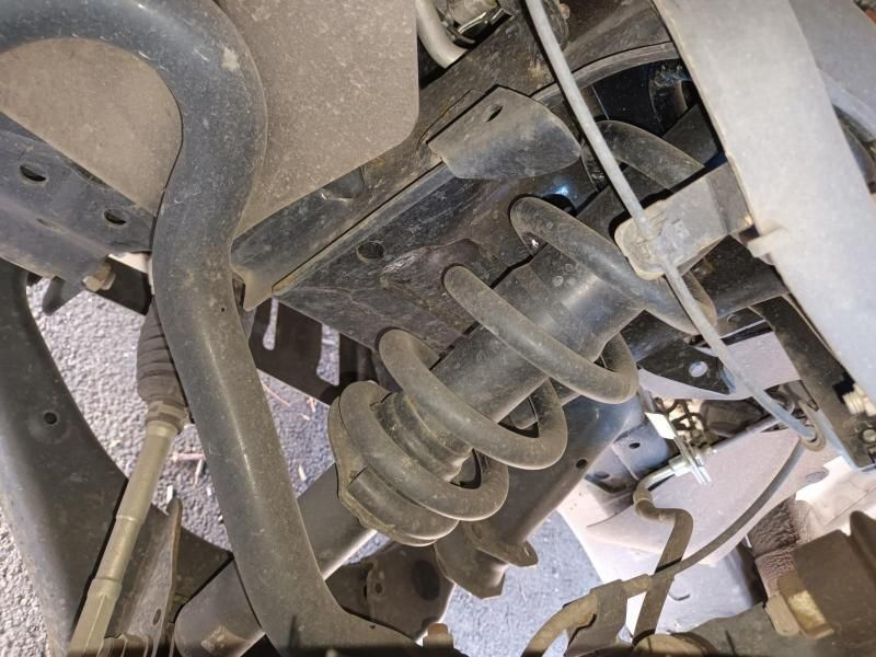 A Close Up of a Shock Absorber on a Car — South West 4WD Wreckers In Harristown, QLD