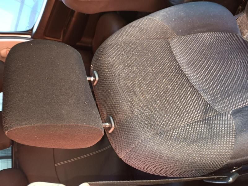 A Person is Sitting in the Back Seat of a Car — South West 4WD Wreckers In Harristown, QLD