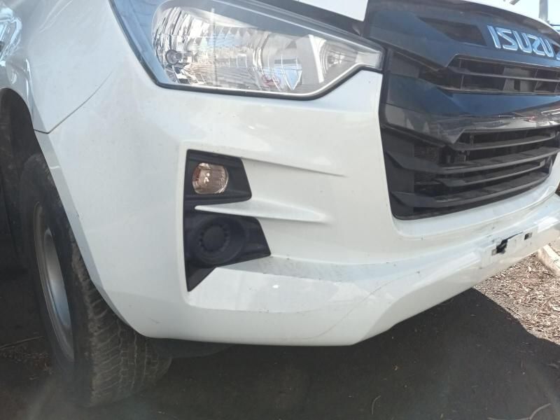 A White Isuzu Truck is Parked on the Side of the Road — South West 4WD Wreckers In Harristown, QLD