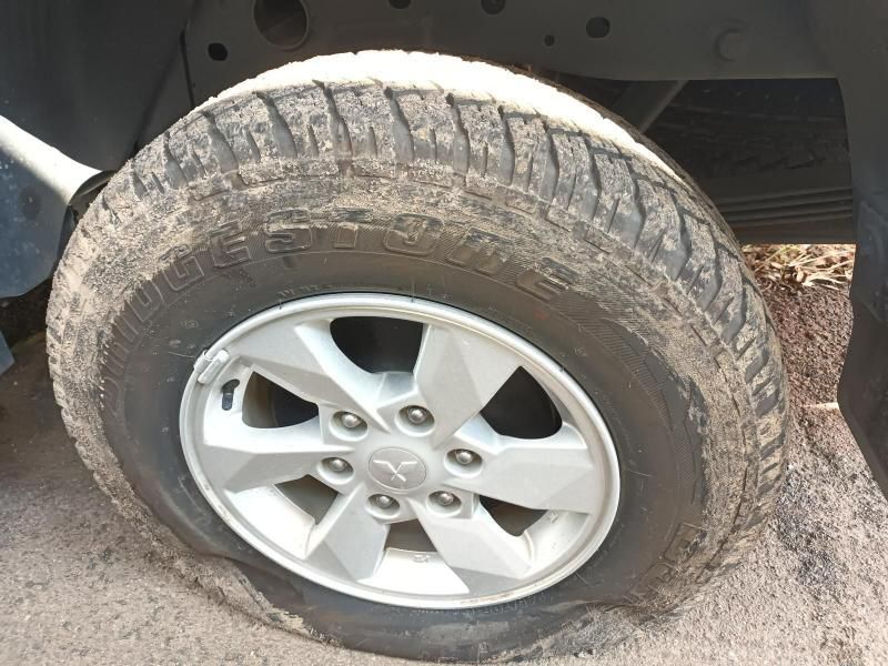A Close Up of a Dirty Tire on a Car — South West 4WD Wreckers In Harristown, QLD
