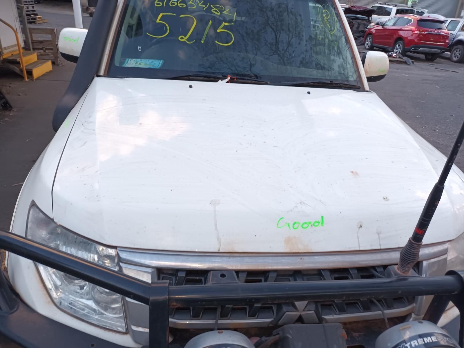 A White Car With the Number 52175 on the Hood — South West 4WD Wreckers In Brisbane, QLD