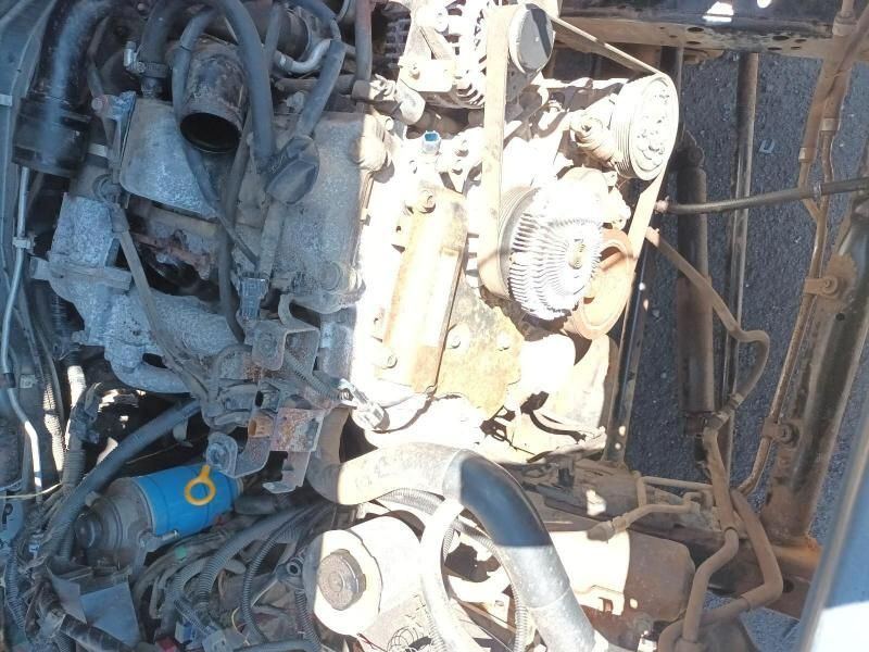 A Close Up of a Rusty Engine With the Letter O on It — South West 4WD Wreckers In Harristown, QLD
