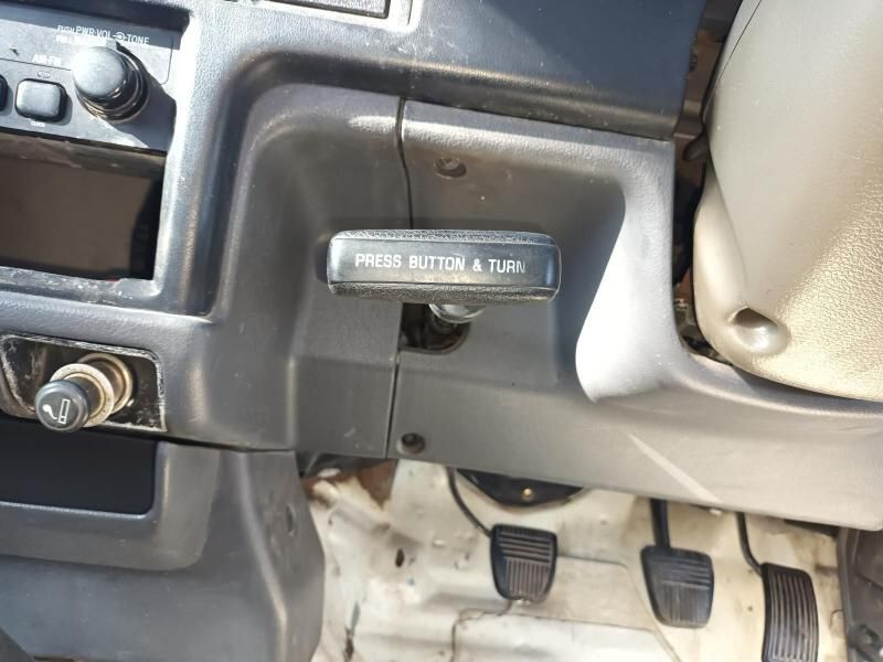 A Close Up of a Car Dashboard With a Press Button and Turn Button — South West 4WD Wreckers In Brisbane, QLD
