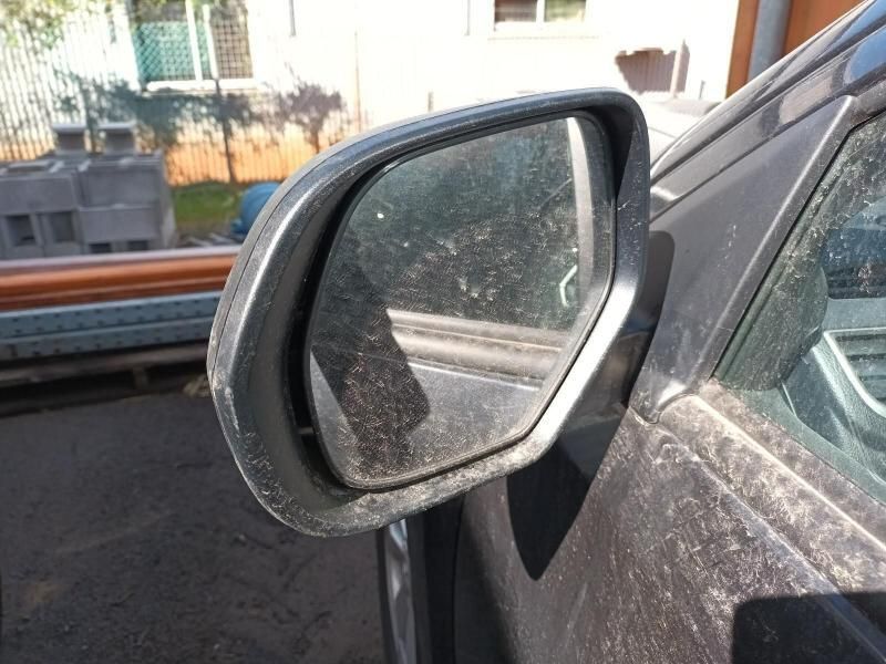 A Dirty Rear View Mirror on a Dirty Car — South West 4WD Wreckers In Harristown, QLD