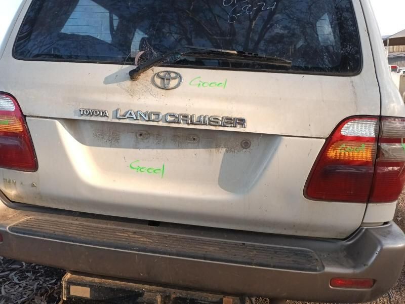 The Back End of a White Toyota Land Cruiser — South West 4WD Wreckers In Harristown, QLD