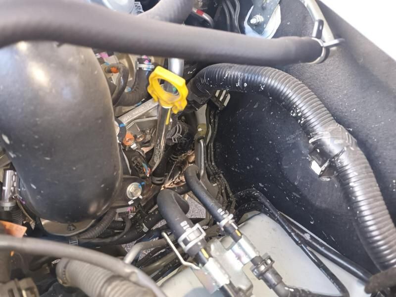 A Close Up of a Car Engine With a Yellow Key in It — South West 4WD Wreckers In Harristown, QLD