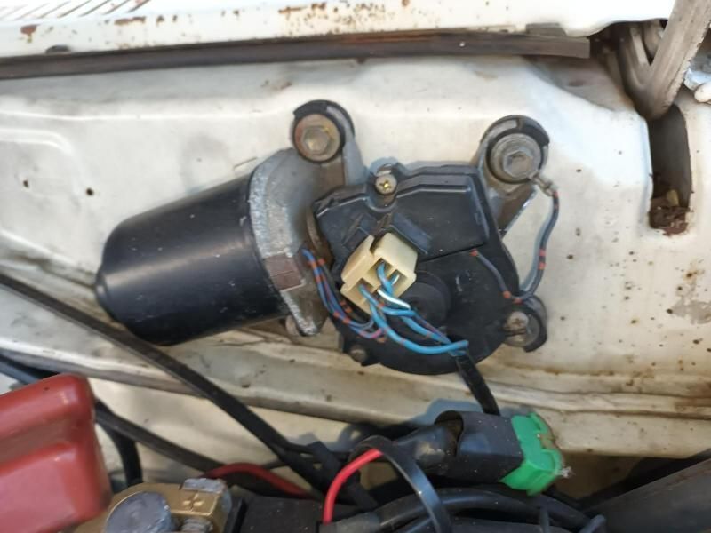 A Wiper Motor is Sitting Under the Hood of a Car — South West 4WD Wreckers In Brisbane, QLD