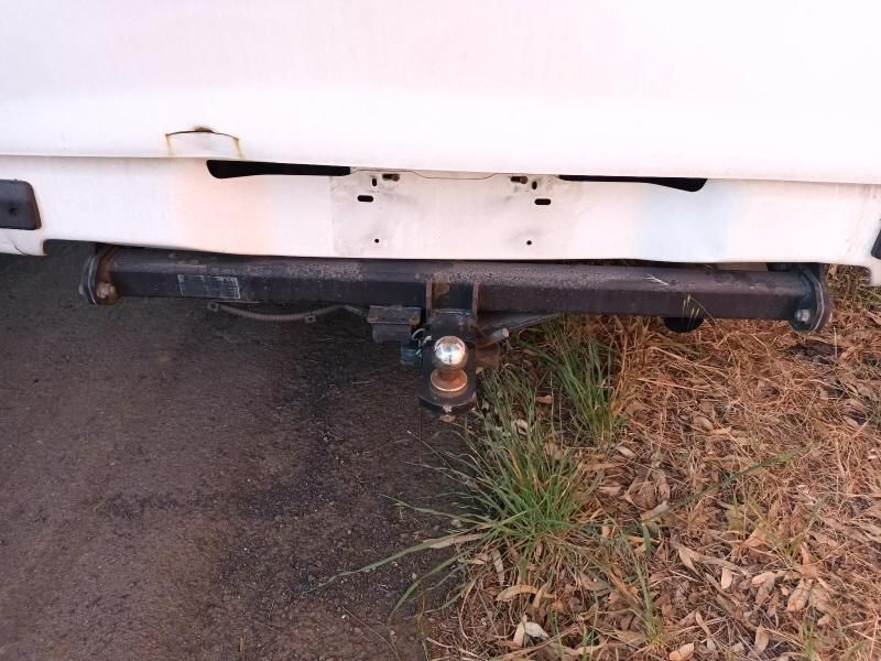 A White Truck With a Trailer Hitch Attached to It — South West 4WD Wreckers In Harristown, QLD