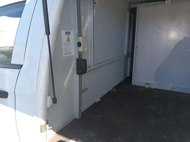 The Inside of a White Van With a Door Open — South West 4WD Wreckers In Harristown, QLD