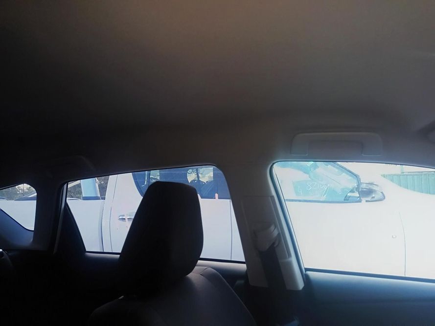 The Inside of a Car with a White Van in the Background — South West 4WD Wreckers in Harristown, QLD