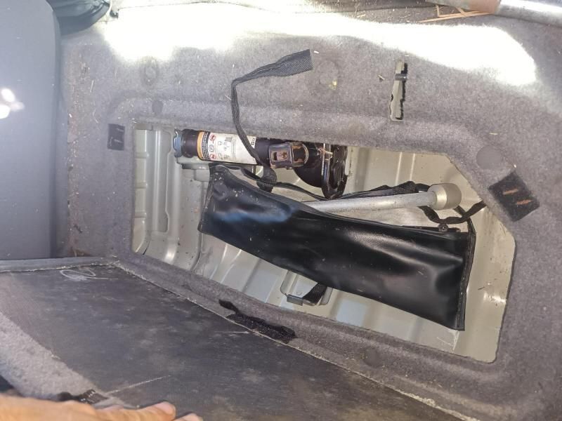 A Black Bag is Sitting in the Trunk of a Car — South West 4WD Wreckers In Harristown, QLD