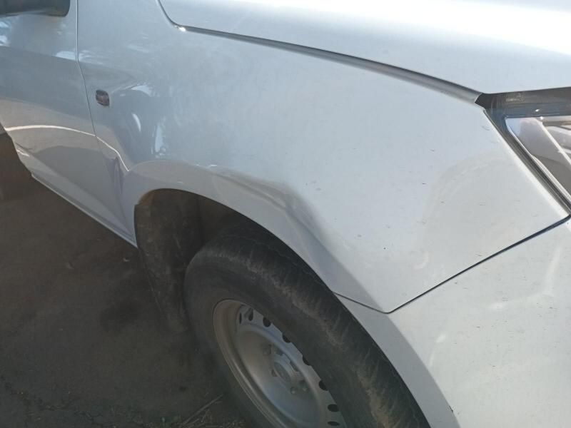 A Close Up of a White Car 's Fender and Tire — South West 4WD Wreckers In Harristown, QLD
