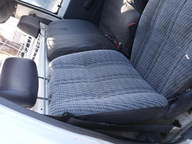 A White Car With Grey Seats and Black Headrests — South West 4WD Wreckers In Brisbane, QLD