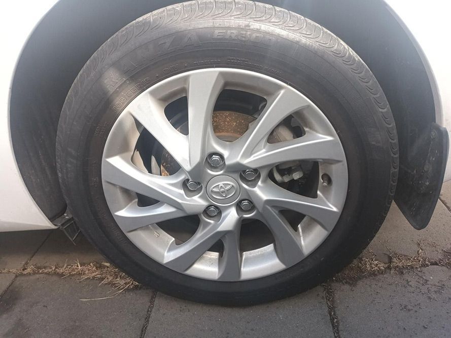 A Close Up of a Car Wheel with a Toyota Logo on It — South West 4WD Wreckers in Harristown, QLD