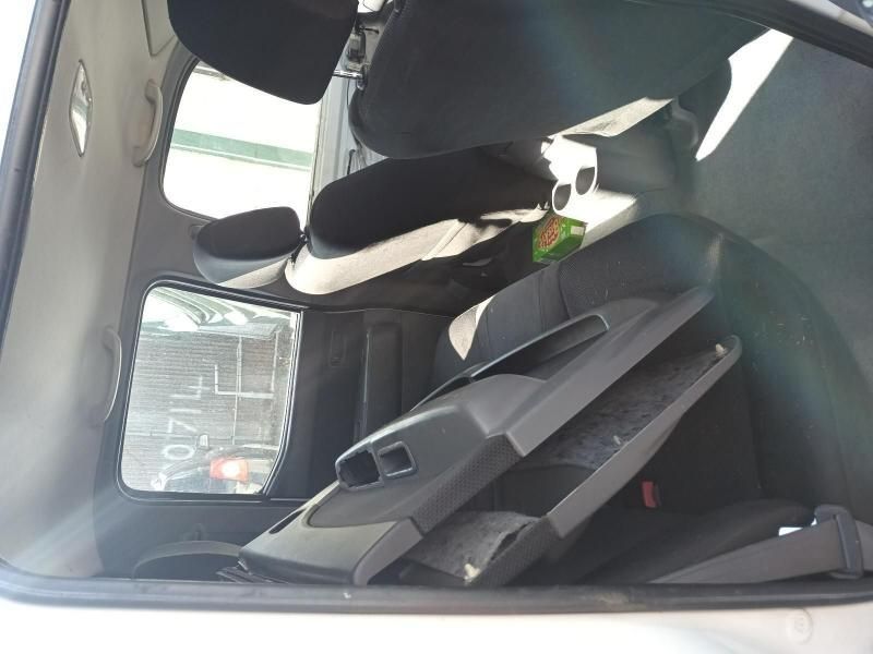 A White Car With a Black Seat and a Mirror — South West 4WD Wreckers In Harristown, QLD