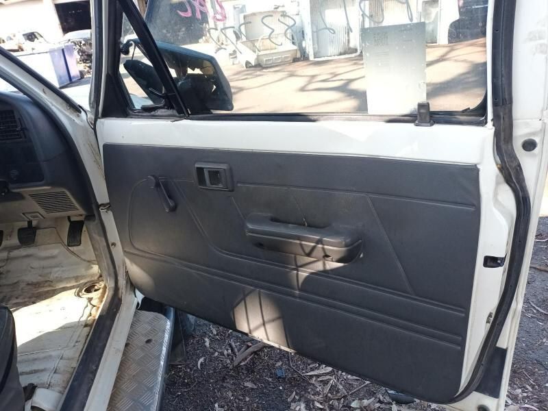 The Inside of a White Car With the Door Open — South West 4WD Wreckers In Brisbane, QLD