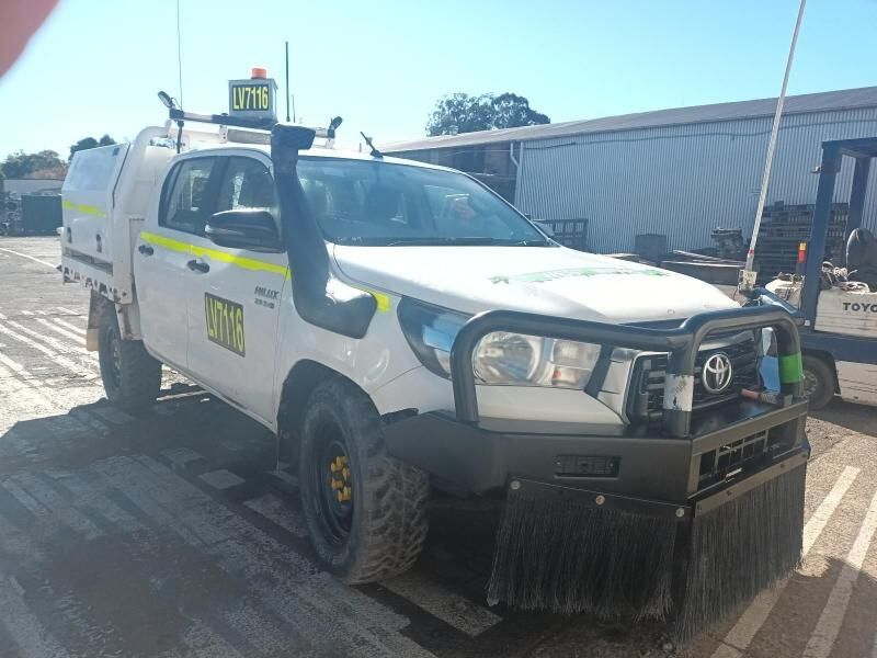 A White Truck With a Snorkel is Parked in a Parking Lot — South West 4WD Wreckers In Brisbane, QLD