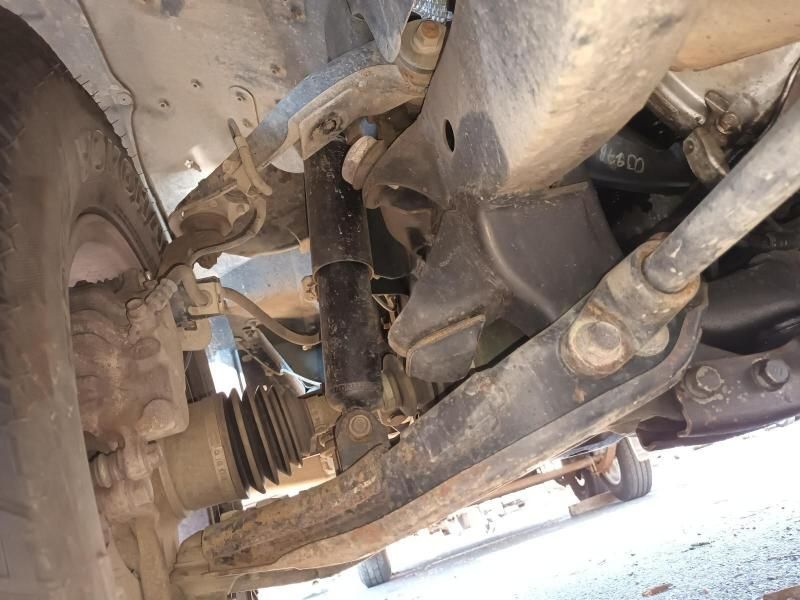 A Close Up of the Underside of a Car With a Shock Absorber — South West 4WD Wreckers In Harristown, QLD