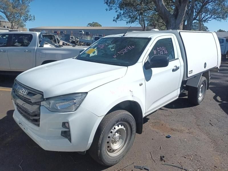A White Truck With a Canopy is Parked in a Parking Lot — South West 4WD Wreckers In Harristown, QLD