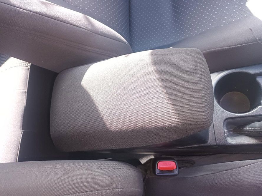A Car Arm Rest with a Red  on It — South West 4WD Wreckers in Harristown, QLD
